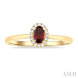 5x3 MM Oval Shape Garnet and 1/20 Ctw Single Cut Diamond Halo Semi-Precious Ring in 14K Yellow Gold