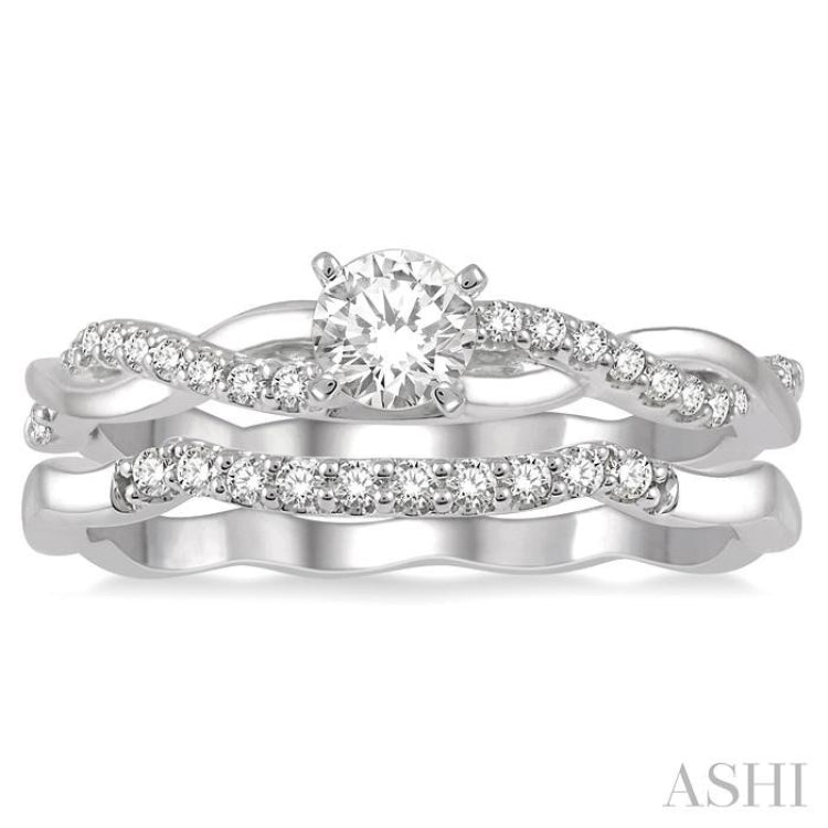 1/2 Ctw Diamond Wedding Set With 1/3 Ct Round Center Diamond Twisted Engagement Ring and 1/10 Ct Wedding Band in 14K White Gold