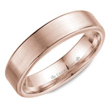 A wedding band in rose gold with a brushed center and polished edges .