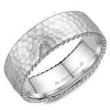A wedding band with a hammered finish and rope detailing.