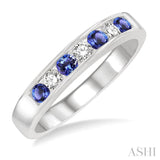 2.5 MM Round Cut Tanzanite and 1/5 Ctw Channel Set Round Cut Diamond Band in 14K White Gold