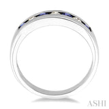 2.5 MM Round Cut Tanzanite and 1/5 Ctw Channel Set Round Cut Diamond Band in 14K White Gold