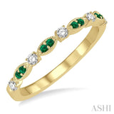 1.35 MM Emerald and 1/6 Ctw Round Cut Diamond Precious Stone Wedding Band in 14K Yellow Gold