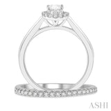3/4 Ctw Round Cut Diamond Wedding Set With 5/8 Ct Oval Cut Engagement Ring and 1/6 Ct Round Cut Diamond Wedding Band in 14K White Gold