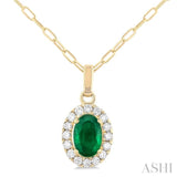 6x4 MM Oval Shape Emerald and 1/6 Ctw Round Cut Diamond Halo Precious Pendant with Chain in 14K Yellow Gold