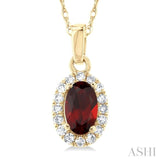 5x3 MM Oval Shape Garnet and 1/20 Ctw Round Cut Diamond Halo Semi-Precious Pendant with Chain in 14K Yellow Gold