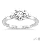 3/4 Ctw Pear and Round Cut Diamond Ladies Engagement Ring With 1/2 Ct Round Cut Center Stone in 14K White Gold