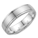 A wedding band with a brushed center and rope detailing.