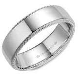 A wedding band with a polished finish and rope detailing on the sides. 