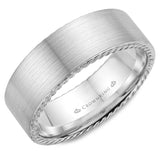 A wedding band in white gold with a brushed finish and rope detailing.