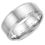 A wedding band with a brushed center and rope detailing on the edges.