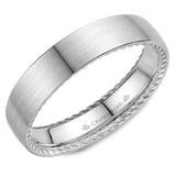 A wedding band in white gold with hidden rope detailing. 
