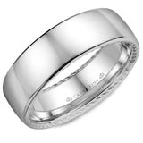 A wedding band in white gold with a polished finish and hidden rope detailing.