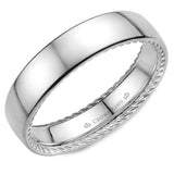 A wedding band with a polished finish and hidden rope detailing.