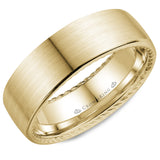 A wedding band in yellow gold with hidden rope detailing. 