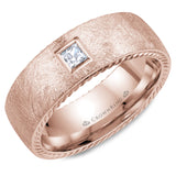 A rose gold wedding band with a princess cut diamond, rope edges and diamond brushed finish. 