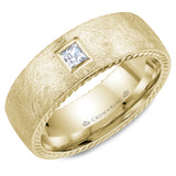 A yellow gold wedding band with a princess cut diamond, rope edges and diamond brushed finish. 