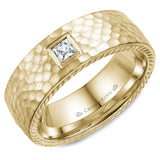 A yellow gold wedding band with a princess cut diamond, rope edges and A hammered finish. 