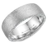 A stylish diamond brushed wedding band in white gold with 118 round diamonds on the sides.