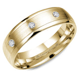A yellow gold wedding band with a brushed center and eight round diamonds.