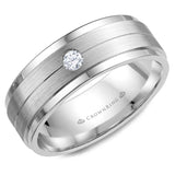 A white gold wedding band with a brushed center and a round diamond.