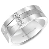 A white gold wedding band with 3 round diamonds.