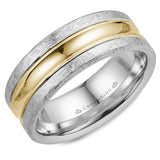 A wedding band in white gold with diamond brushed edges and a yellow gold center.