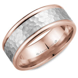 A rose gold wedding band with hammered white gold center.