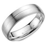 A brushed white gold wedding band with line detailing.