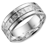 A white gold wedding band with a hammered center, line detailing and beveled edges. 
