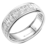 A textured white gold wedding band with polished edges. 