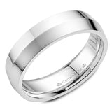 A white gold wedding band with a knife edge.