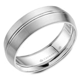A white gold wedding band with line detailing. 