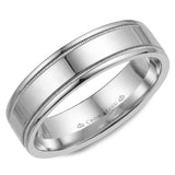 A white gold wedding band with a polished finish and milgrain detailing.
