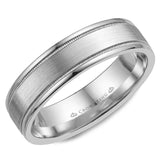 A white gold wedding band with a brushed  center and milgrain detailing.