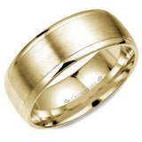 A yellow gold wedding band with a brushed center. 