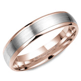A rose gold wedding band with a white gold brushed center. 