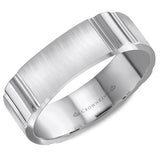 A white gold wedding band with notch detailing.