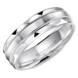 A wedding band with a brushed center, milgrain detailing and textured edges.