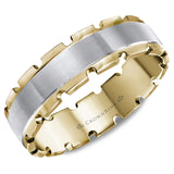 A yellow gold wedding band with a brushed white gold center and indented edges.