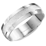 A white gold wedding band with a textured center and beveled edges. 