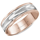 A rose gold wedding band with a patterned white gold center and milgrain detailing. 