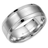 A wedding band in white gold with a brushed center and delicate milgrain detailing.