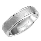 A hammered white gold wedding band with polished edges.