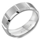 A brushed  white gold wedding band with notch detailing.