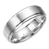 A white gold wedding band with a brushed center.