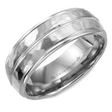 A white gold wedding band with a hammered finish and line detailing.