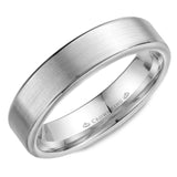 A wedding band in white gold with a brushed center and polished edges.