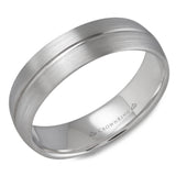 A white gold wedding band with a brushed finish and line detailing.