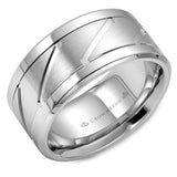 A white gold wedding band with a brushed center and line detailing. 